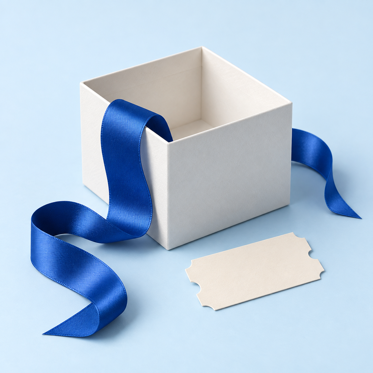 An open white gift box with a blue ribbon